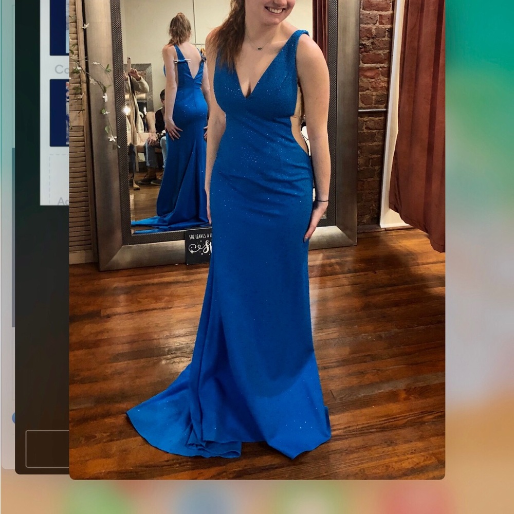 Beautiful prom or pageant dress. Was a size 8 and altered to fit a size 6.